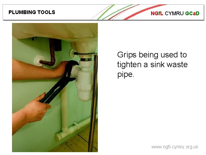 PLUMBING TOOLS NGf. L CYMRU GCa. D Grips being used to tighten a sink