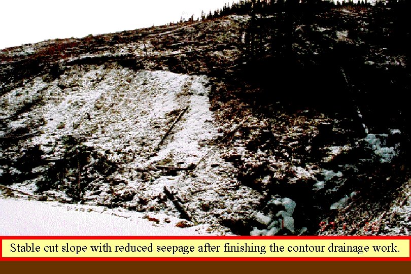 Stable cut slope with reduced seepage after finishing the contour drainage work. 