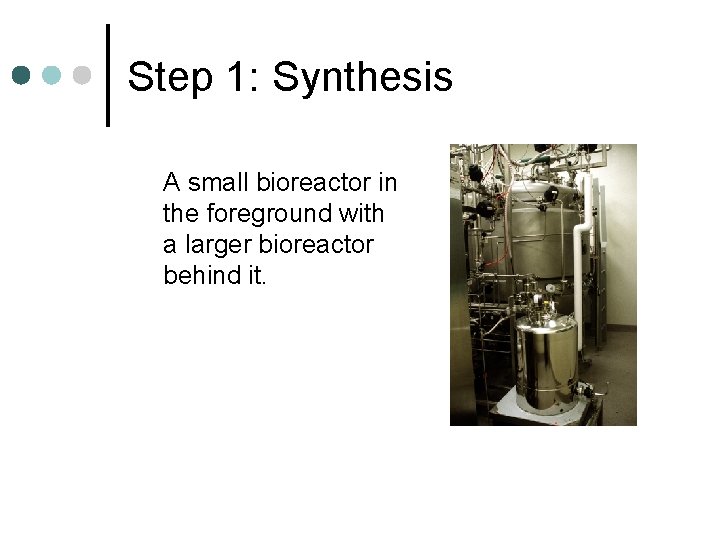 Step 1: Synthesis A small bioreactor in the foreground with a larger bioreactor behind
