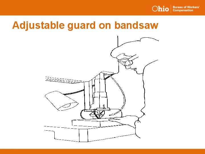 Adjustable guard on bandsaw 