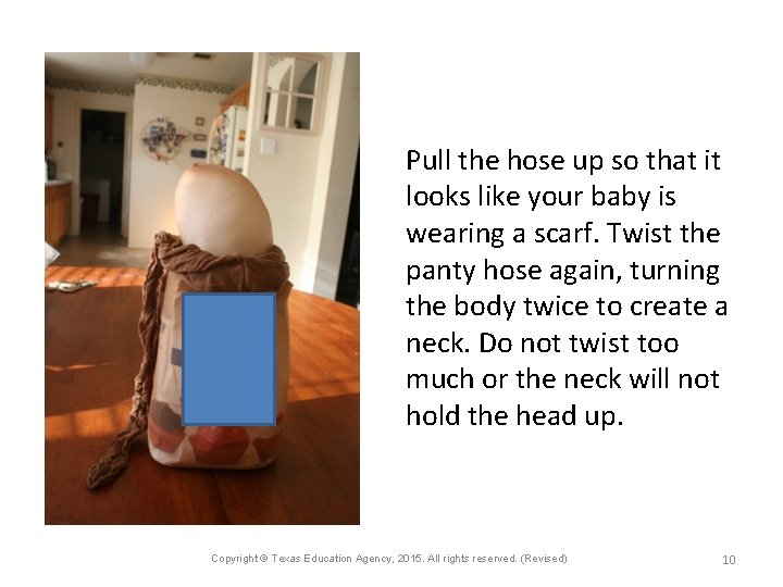 Pull the hose up so that it looks like your baby is wearing a