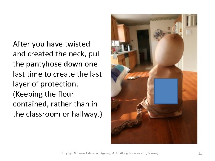 After you have twisted and created the neck, pull the pantyhose down one last