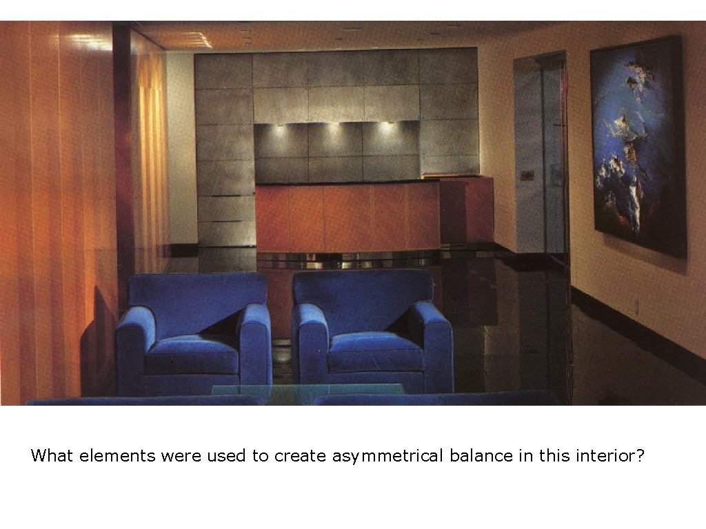 What elements were used to create asymmetrical balance in this interior? 