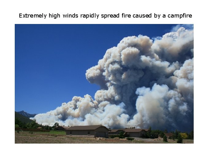 Extremely high winds rapidly spread fire caused by a campfire 