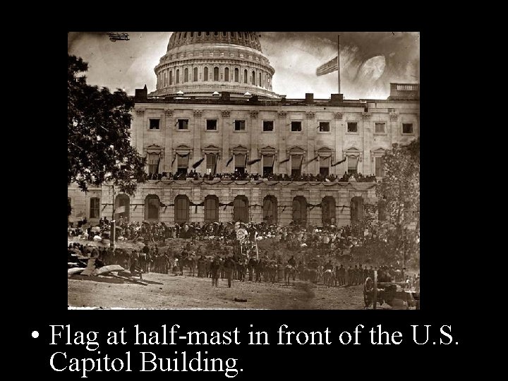  • Flag at half-mast in front of the U. S. Capitol Building. 