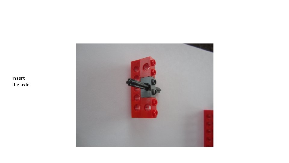 Insert the axle. 