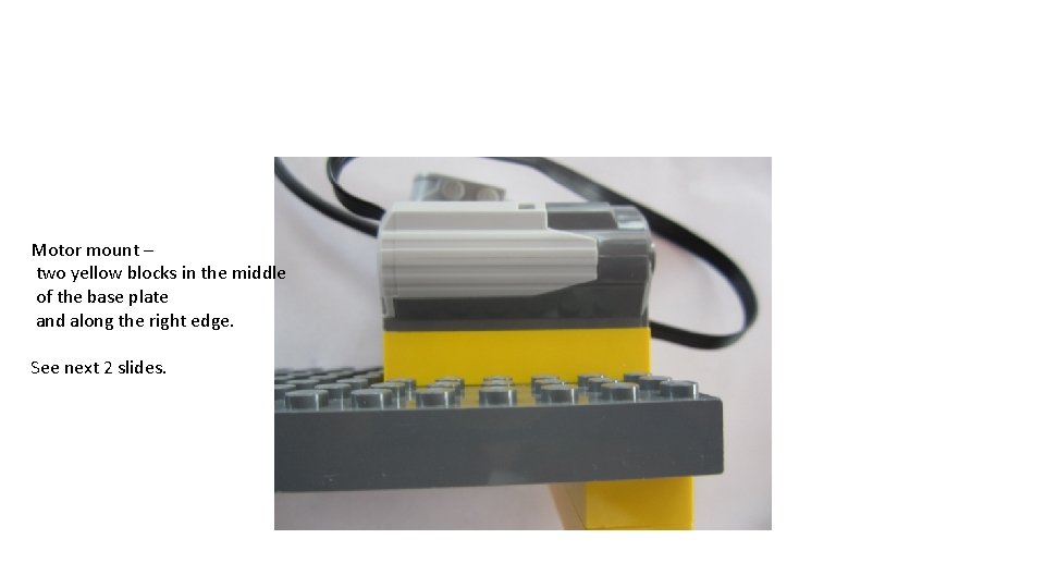 Motor mount – two yellow blocks in the middle of the base plate and