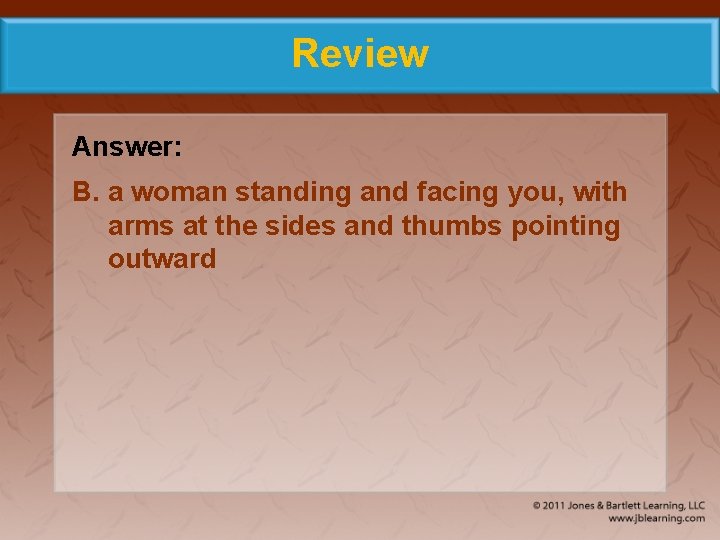 Review Answer: B. a woman standing and facing you, with arms at the sides