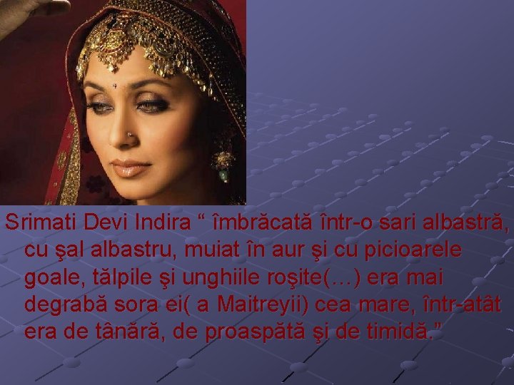 Srimati Devi Indira “ îmbrăcată într-o sari albastră, cu şal albastru, muiat în aur
