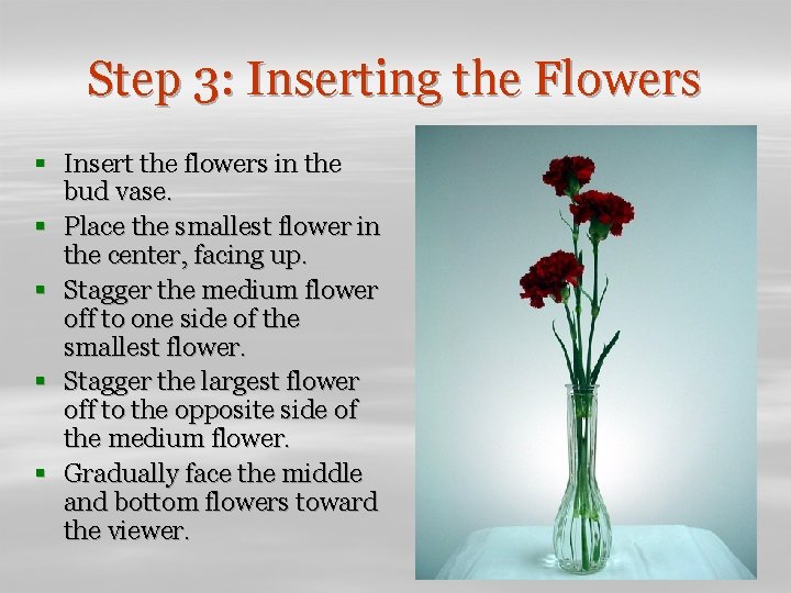 Step 3: Inserting the Flowers § Insert the flowers in the bud vase. §