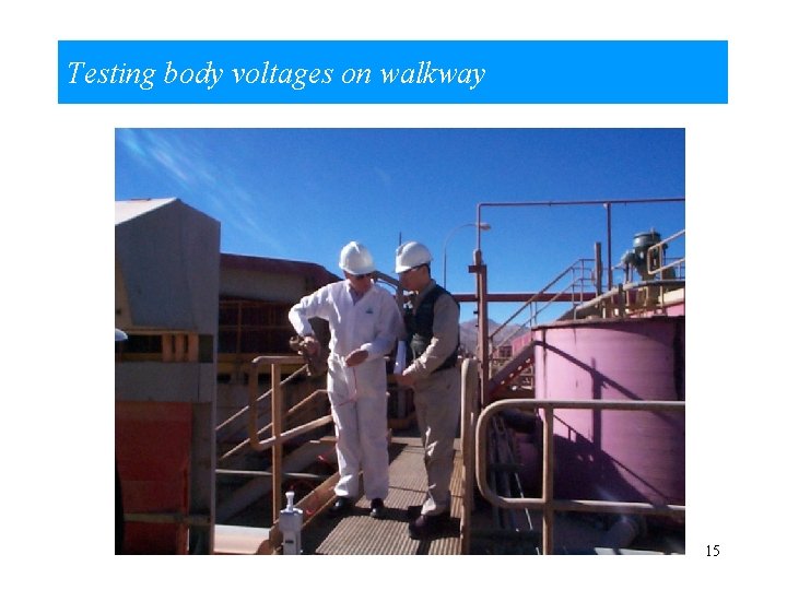 Testing body voltages on walkway 15 