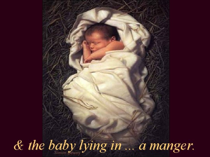 & the baby lying in. . . a manger. 