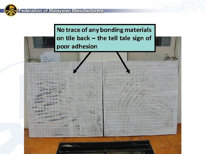 No trace of any bonding materials on tile back – the tell tale sign