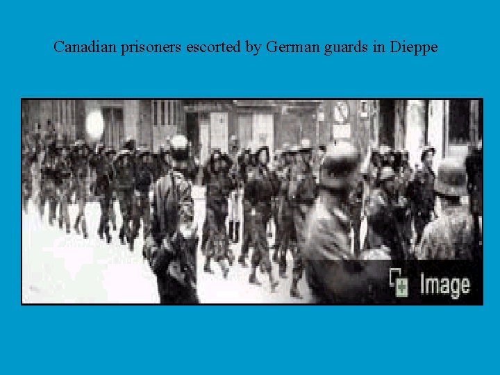 Canadian prisoners escorted by German guards in Dieppe 