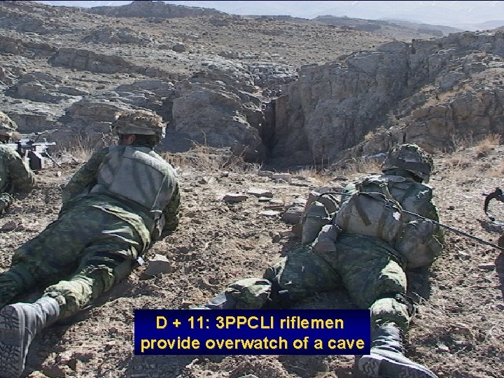 D + 11: 3 PPCLI riflemen provide overwatch of a cave 