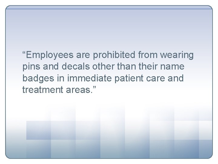 “Employees are prohibited from wearing pins and decals other than their name badges in