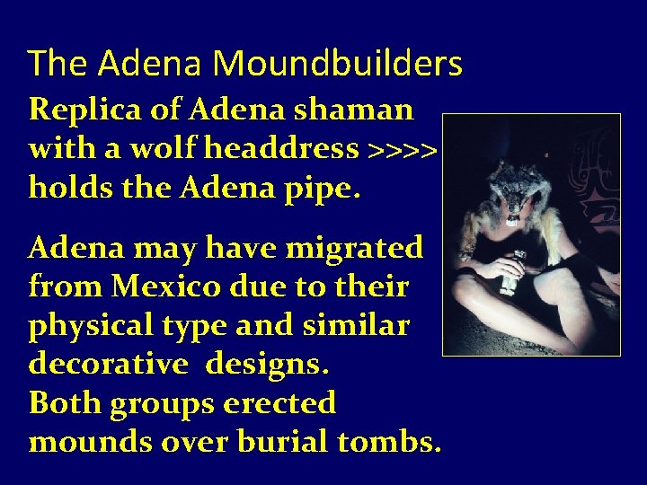 The Adena Moundbuilders Replica of Adena shaman with a wolf headdress >>>> holds the