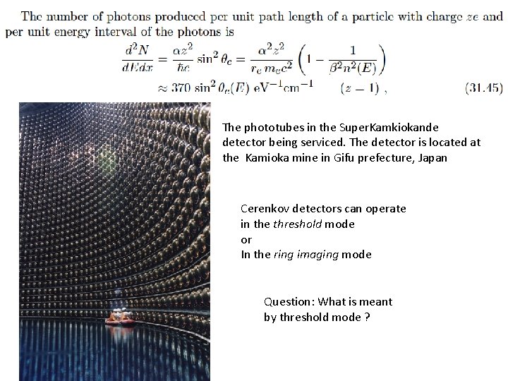 The phototubes in the Super. Kamkiokande detector being serviced. The detector is located at