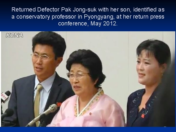 Returned Defector Pak Jong-suk with her son, identified as a conservatory professor in Pyongyang,