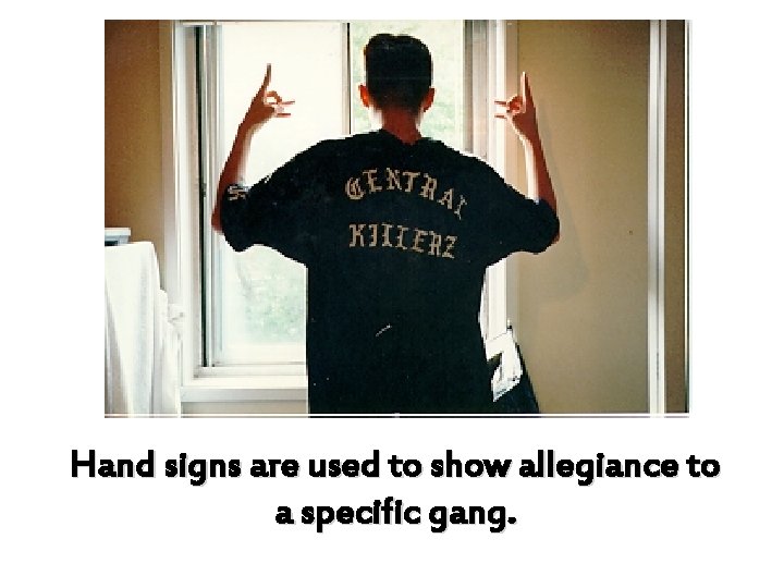 Hand signs are used to show allegiance to a specific gang. 