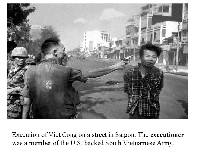 Execution of Viet Cong on a street in Saigon. The executioner was a member