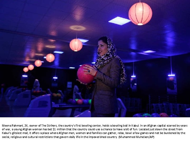 Meena Rahmani, 26, owner of The Strikers, the country's first bowling center, holds a