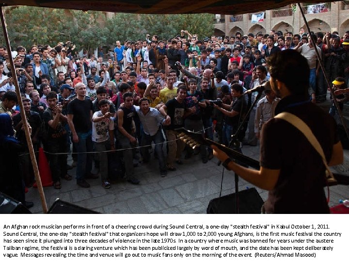 An Afghan rock musician performs in front of a cheering crowd during Sound Central,