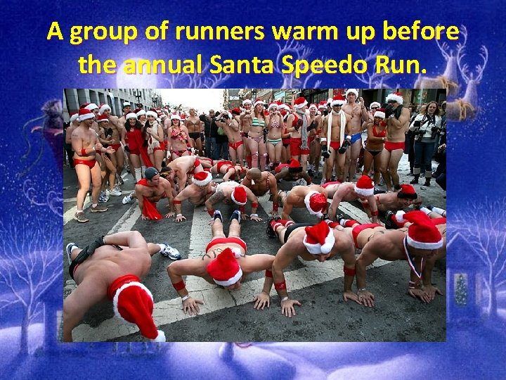 A group of runners warm up before the annual Santa Speedo Run. 