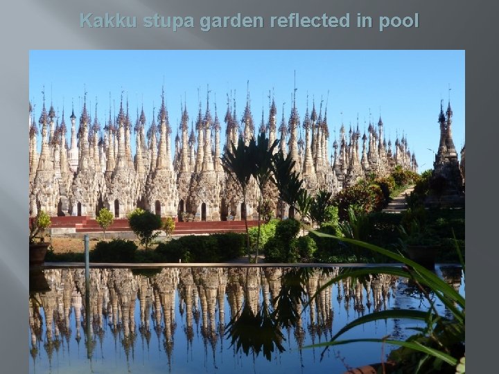 Kakku stupa garden reflected in pool 