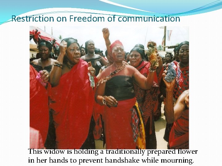 Restriction on Freedom of communication This widow is holding a traditionally prepared flower in