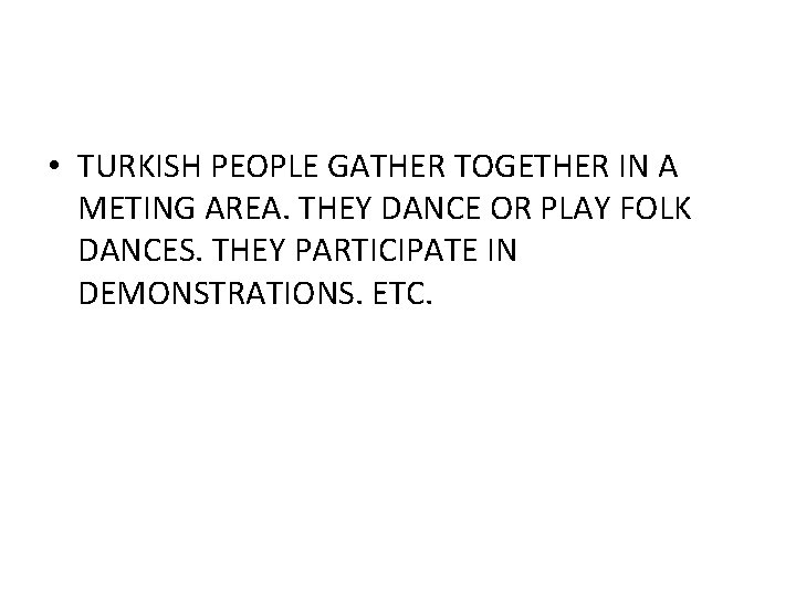  • TURKISH PEOPLE GATHER TOGETHER IN A METING AREA. THEY DANCE OR PLAY