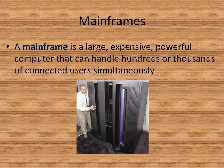 Mainframes • A mainframe is a large, expensive, powerful computer that can handle hundreds