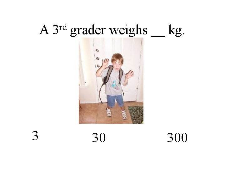 A 3 rd 3 grader weighs __ kg. 30 300 