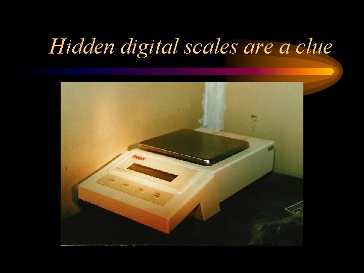 Hidden digital scales are a clue 