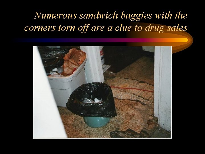 Numerous sandwich baggies with the corners torn off are a clue to drug sales