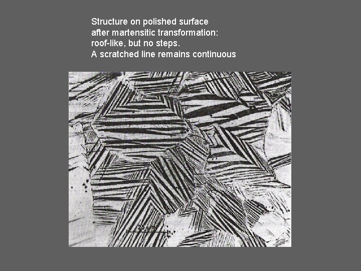 Structure on polished surface after martensitic transformation: roof-like, but no steps. A scratched line
