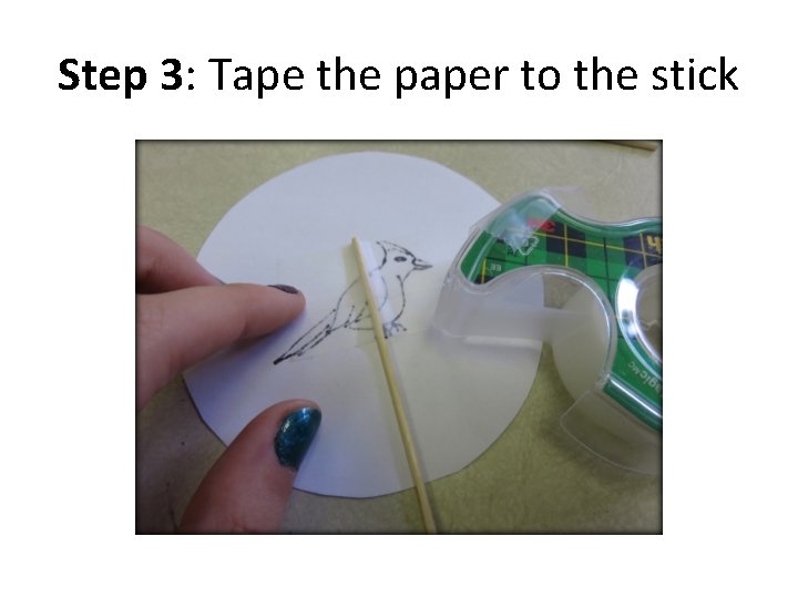 Step 3: Tape the paper to the stick 