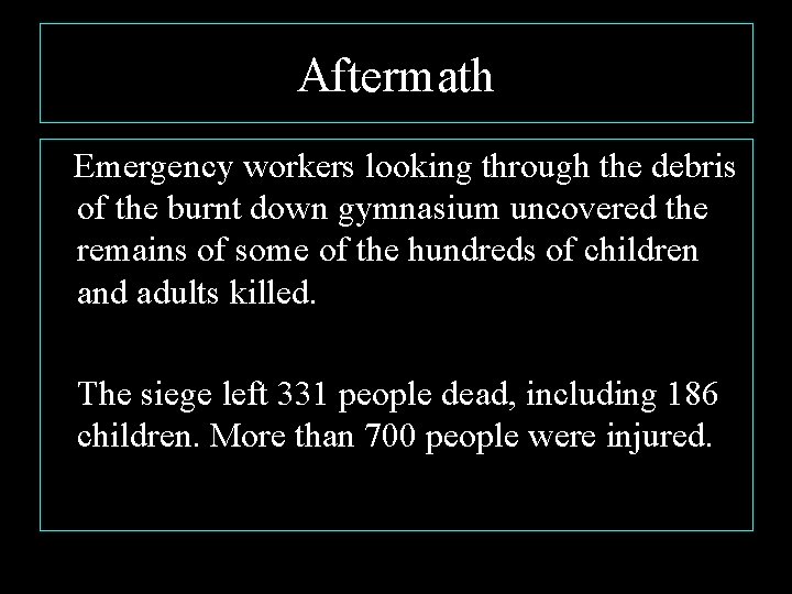 Aftermath Emergency workers looking through the debris of the burnt down gymnasium uncovered the