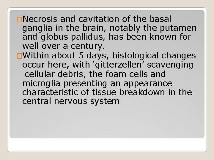 �Necrosis and cavitation of the basal ganglia in the brain, notably the putamen and