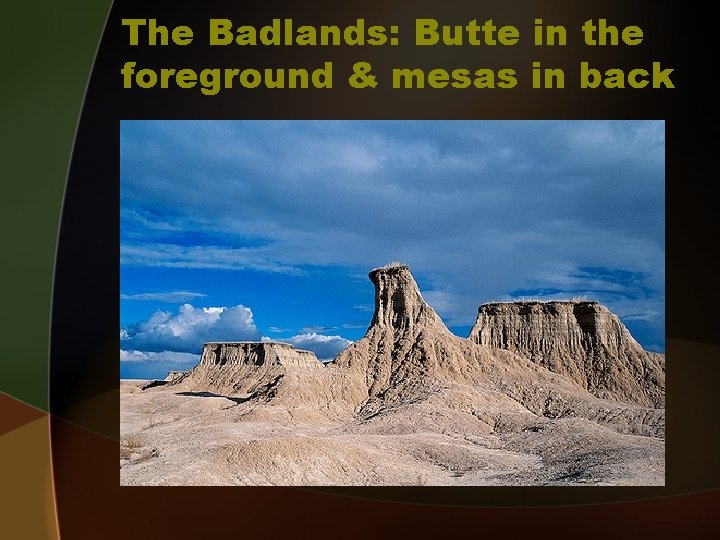 The Badlands: Butte in the foreground & mesas in back 