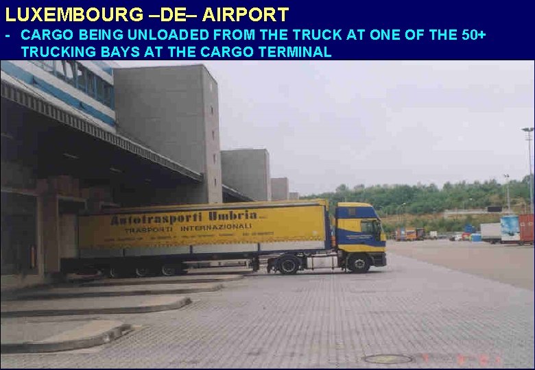 LUXEMBOURG –DE– AIRPORT - CARGO BEING UNLOADED FROM THE TRUCK AT ONE OF THE