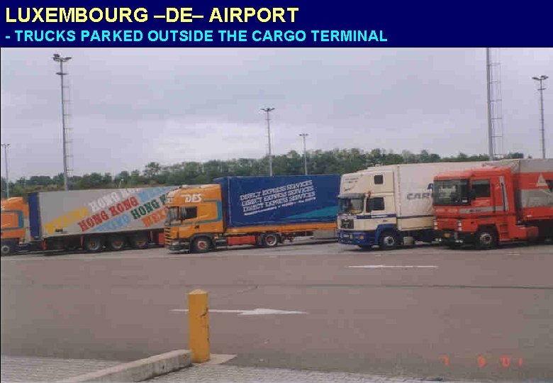 LUXEMBOURG –DE– AIRPORT - TRUCKS PARKED OUTSIDE THE CARGO TERMINAL 
