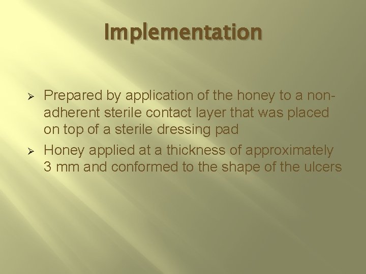 Implementation Ø Ø Prepared by application of the honey to a nonadherent sterile contact