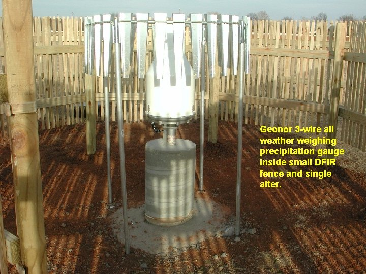 Geonor 3 -wire all weather weighing precipitation gauge inside small DFIR fence and single