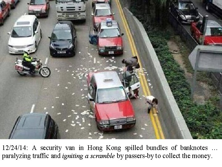 12/24/14: A security van in Hong Kong spilled bundles of banknotes … paralyzing traffic