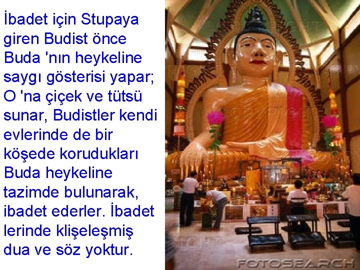 İbadet için Stupaya giren Budist önce Buda 'nın heykeline saygı gösterisi yapar; O 'na