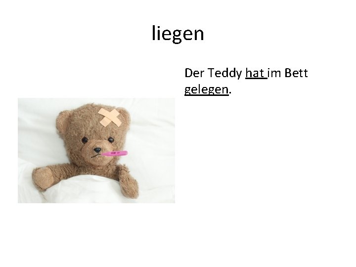 liegen Der Teddy hat im Bett gelegen. 