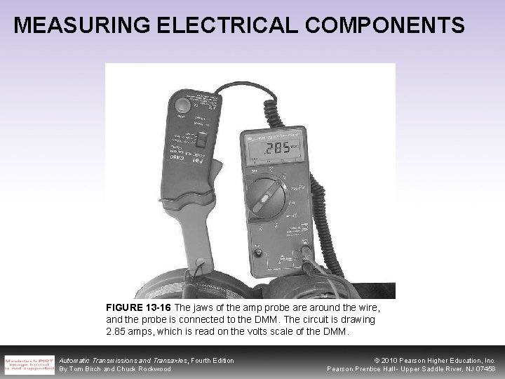 MEASURING ELECTRICAL COMPONENTS FIGURE 13 -16 The jaws of the amp probe around the