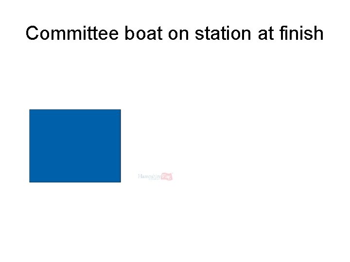 Committee boat on station at finish 