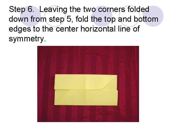 Step 6. Leaving the two corners folded down from step 5, fold the top